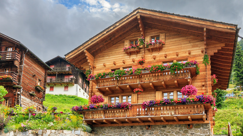 traditional mountain chalet with flowers