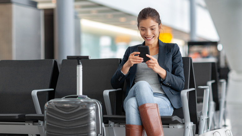 Woman smiling in airport