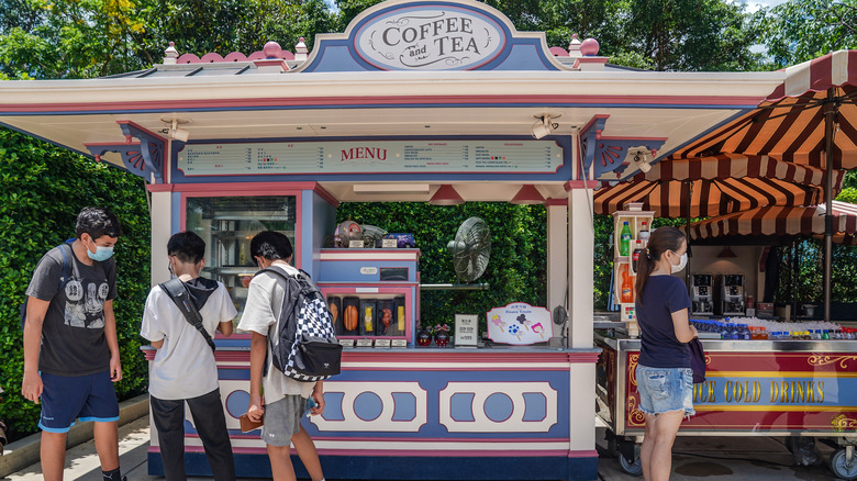 Visitors at a coffee stand in Disneyland