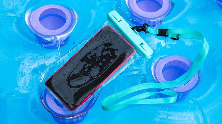 Phone pouch on pool floaty