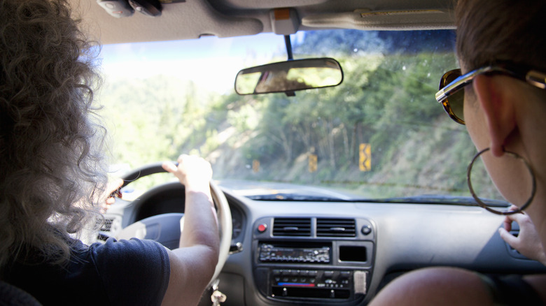 two women in car together