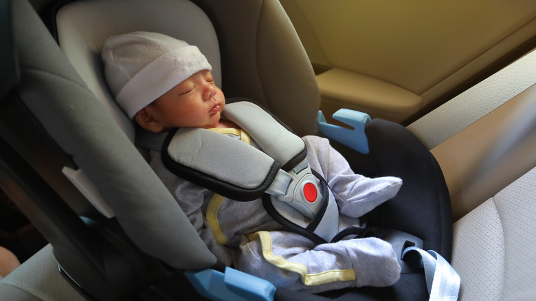 newborn bundled in car seat