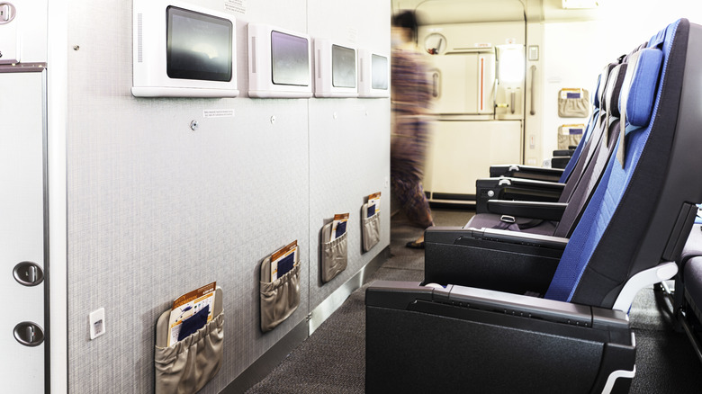 Seats behind plane bulkhead