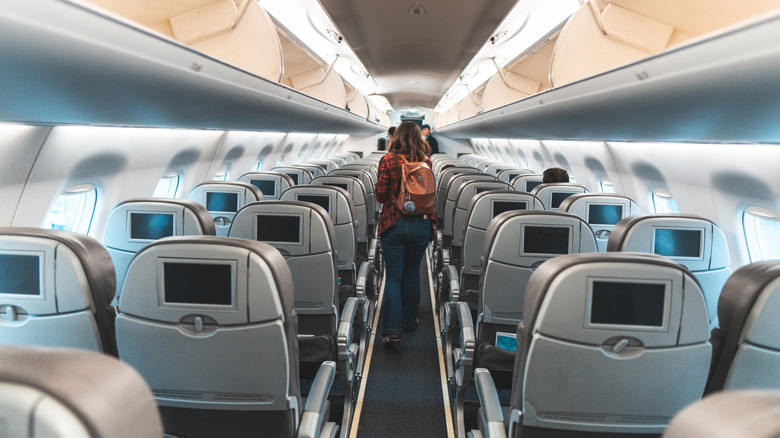Woman on empty plane