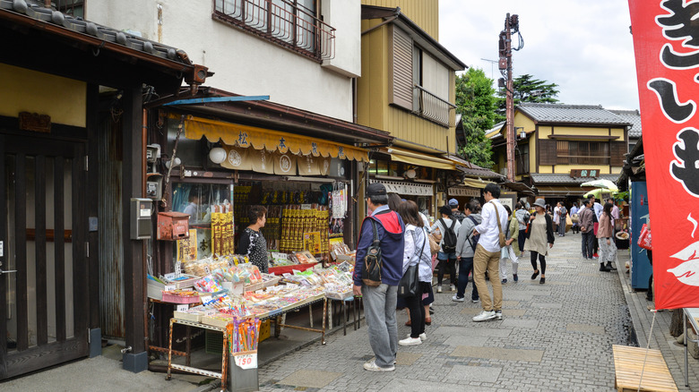 Patrons visiting shops along Candy Lane