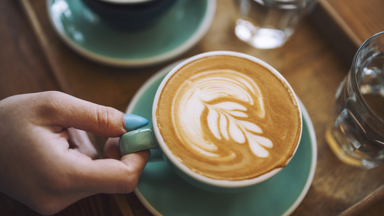 Caffe latte and painted nails