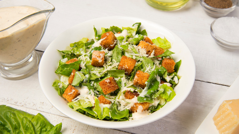 a dish of Caesar salad