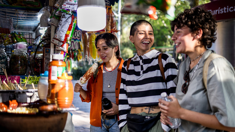 friends buying food in Mexico