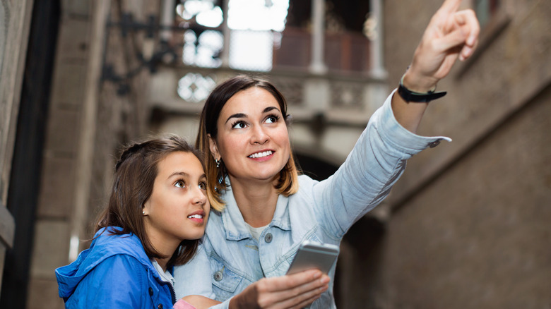 Mother and daughter sightseeing