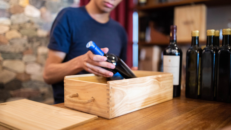 Bottle of wine in a wooden box