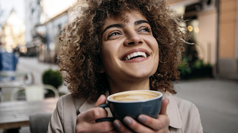 woman drinking coffee