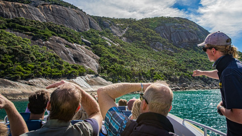 Tour Guide and Tourists Observing