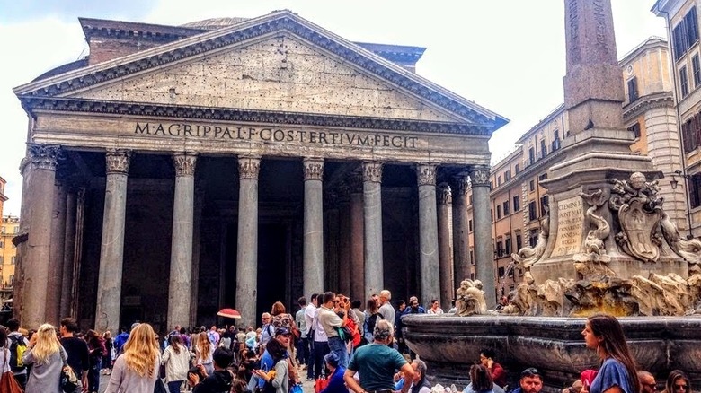 Pantheon with tourists and fountain