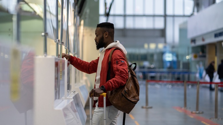 man at passport control