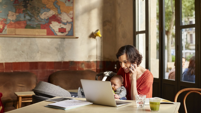 Mother using a laptop