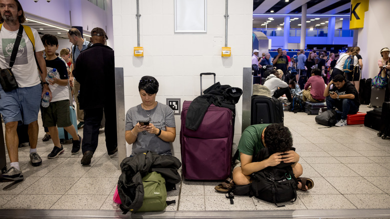 Frustrated passengers waiting for flight