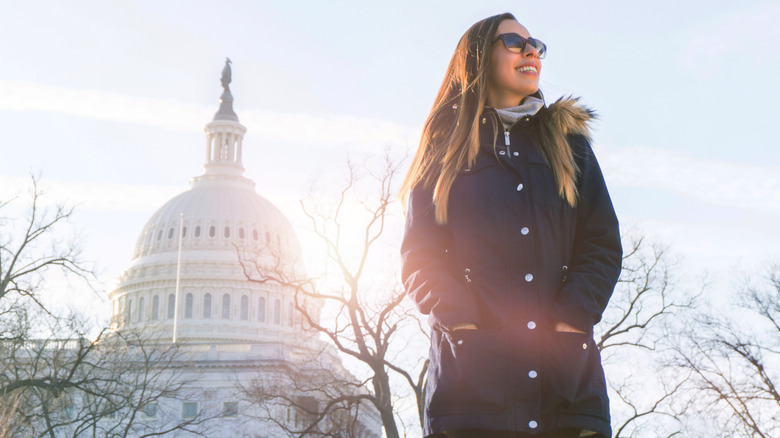 Girl standing in front of Capitol Building