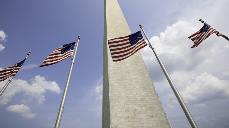 Washington Monument with American flags