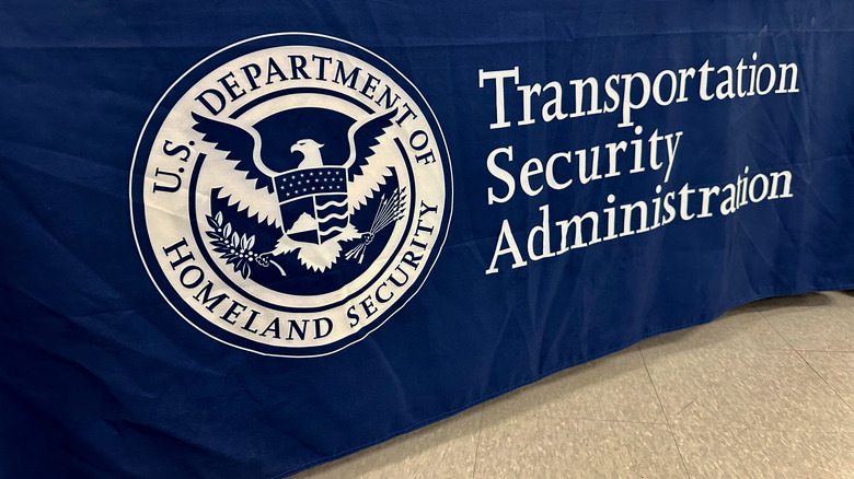 TSA Agent with a handgun