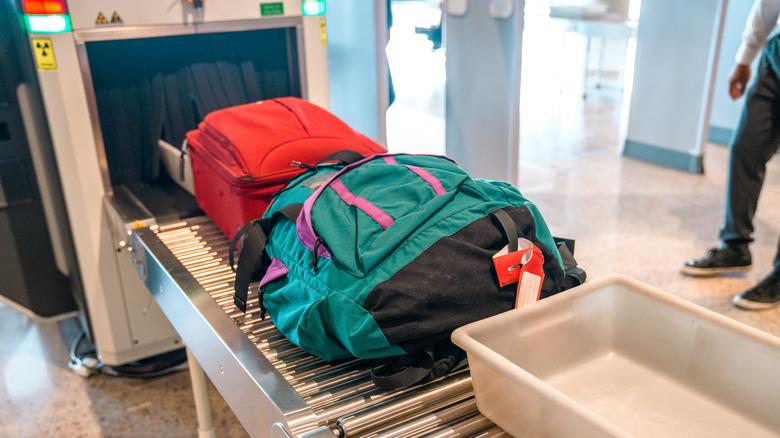 bags at airport security checkpoint