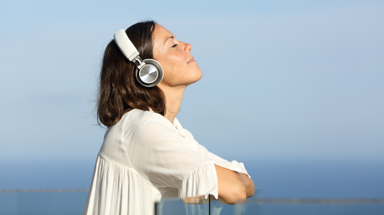 Cruise guest with headphones