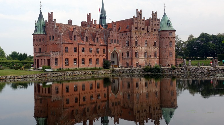 Egeskov Castle and its water reflection