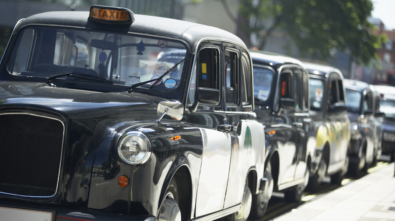 Lineup of black UK taxis