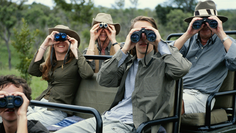 People on safari with binoculars