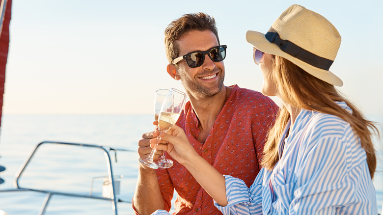 Couple and Champagne toast on a boat