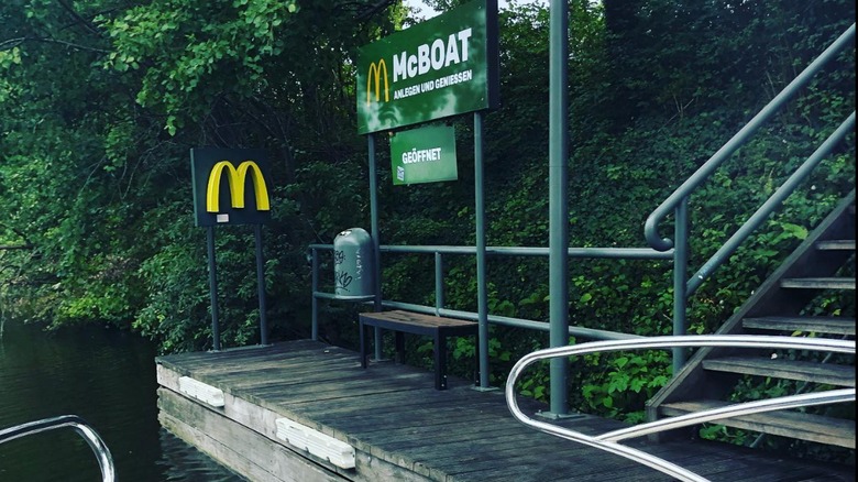 wooden dock with McBoat sign