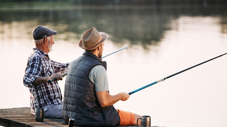 Men fishing from a dock