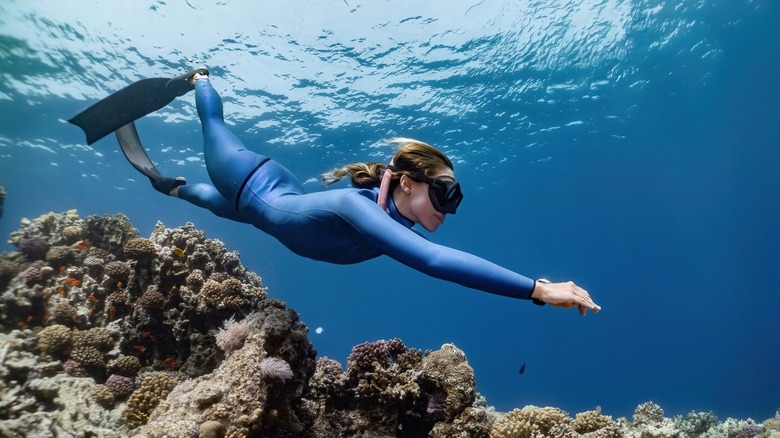Woman free diving