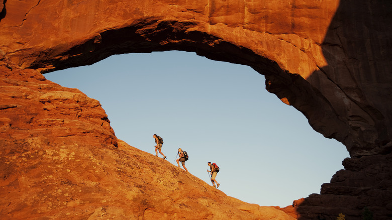 hikers at arches national park
