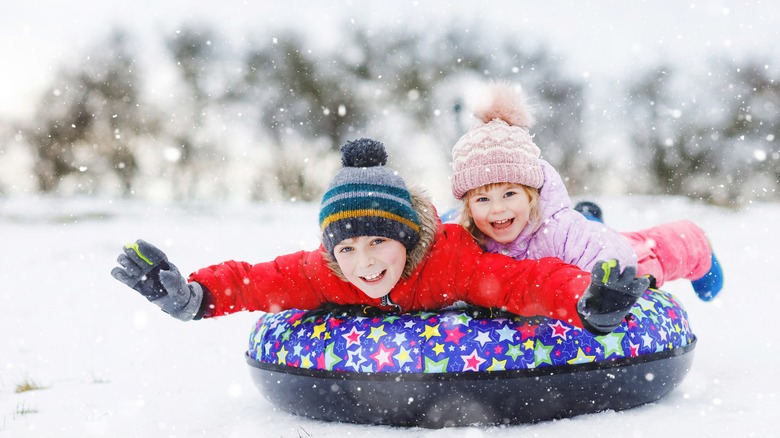 Children snow tubing