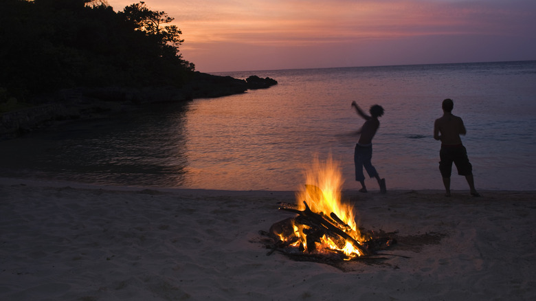 People dancing on the beach