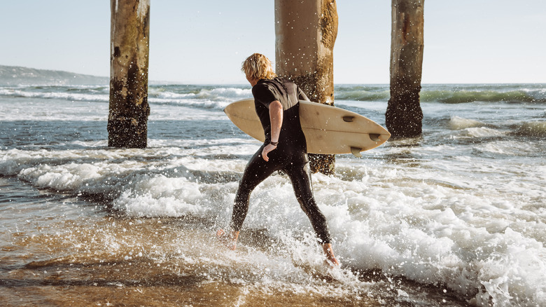 Male surfer at Huntington Beach 