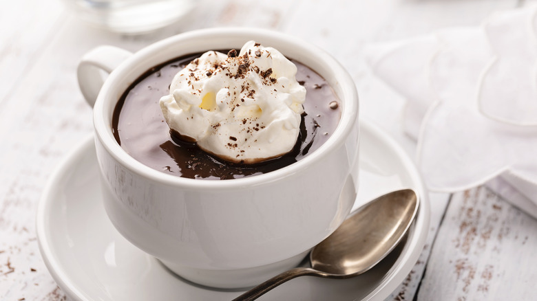 Thick, creamy hot chocolate topped with whipped cream