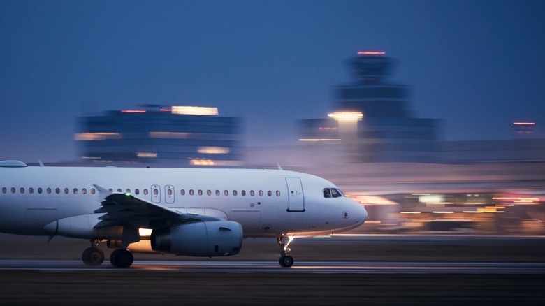 Plane taking off at night