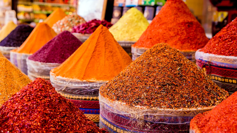 Mounts of colorful spices at a market in Egypt