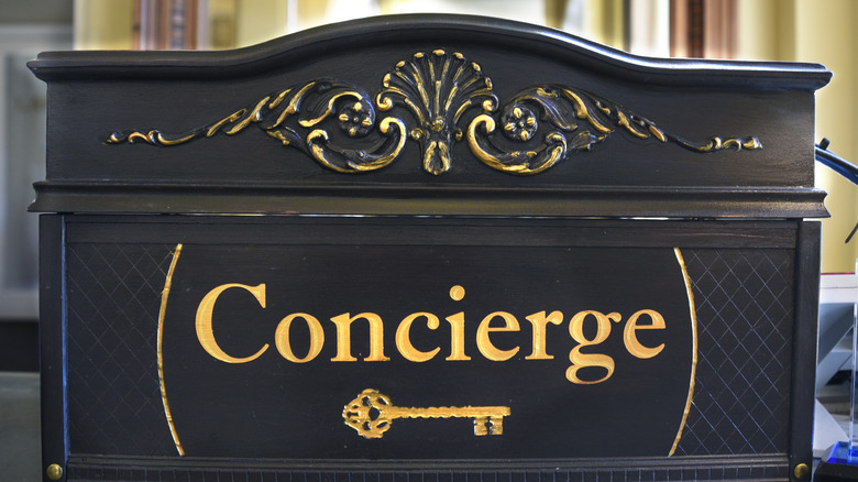 golden key concierge sign