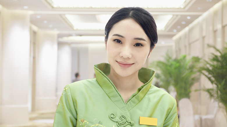 Asian female concierge 