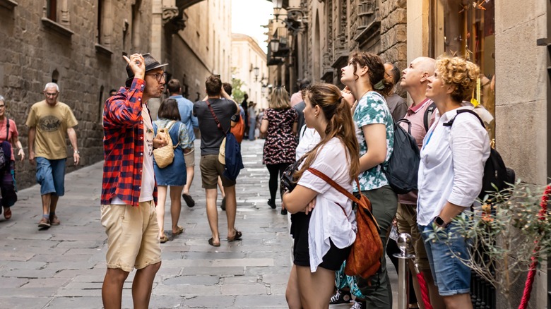 tourists listening to a guide