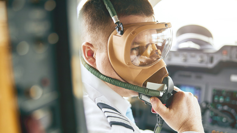 pilot wearing specialized air mask