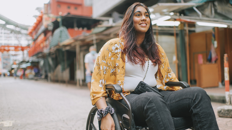 Female traveler in a wheelchair