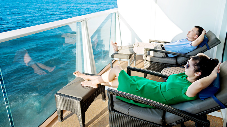 Couple relaxing on a private cruise veranda