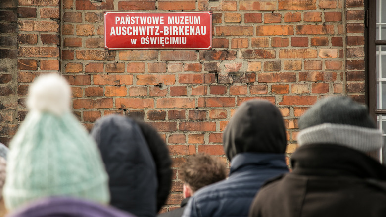 Auschwitz-Birkenau sign and tour