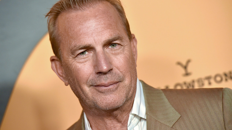 Kevin Costner smiling for photo