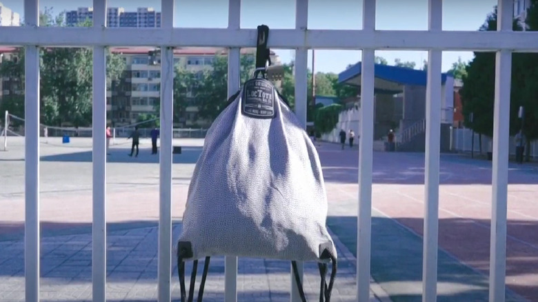 Loctote bag strapped to fence