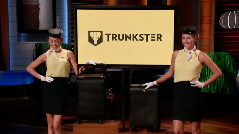 women presenting trunkster suitcases