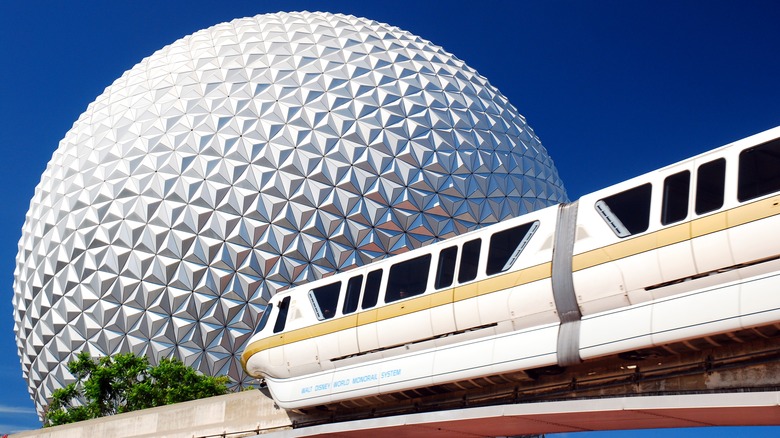 Epcot monorail Spaceship Earth blue sky